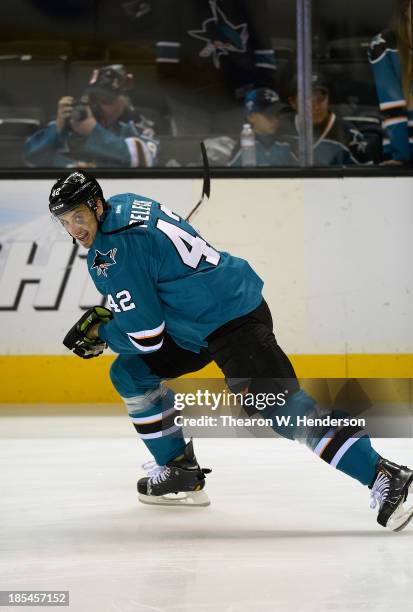 Matt Pelech of the San Jose Sharks skates during pre-game warm ups prior to playing the Calgary Flames at SAP Center on October 19, 2013 in San Jose,...