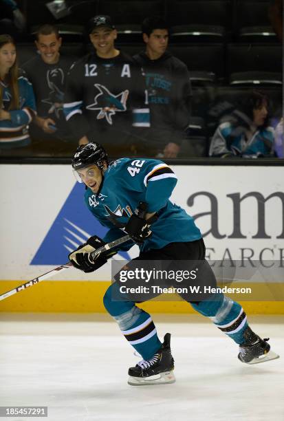 Matt Pelech of the San Jose Sharks skates during pre-game warm ups prior to playing the Calgary Flames at SAP Center on October 19, 2013 in San Jose,...