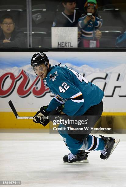 Matt Pelech of the San Jose Sharks skates during pre-game warm ups prior to playing the Calgary Flames at SAP Center on October 19, 2013 in San Jose,...