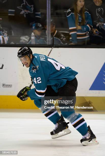 Matt Pelech of the San Jose Sharks skates during pre-game warm ups prior to playing the Calgary Flames at SAP Center on October 19, 2013 in San Jose,...