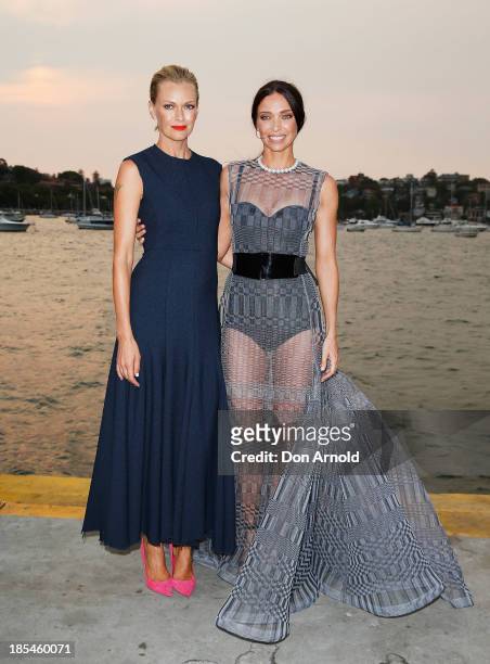 Sarah Murdoch and Erica Packer pose before boarding a yacht at a launch event for the November issue of Vogue on October 21, 2013 in Sydney,...