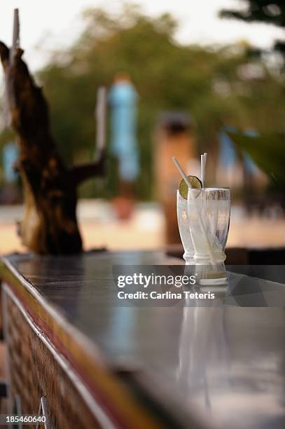 empty glasses on an outdoor bar - food table edge stock pictures, royalty-free photos & images