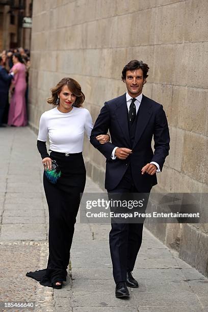 Rafael Medina and Laura Vecino attend the wedding of bullfighter Miguel Angel Perera and Veronica Gutierrez at Old Cathedral on October 19, 2013 in...