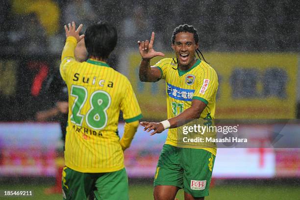 Kempes , whose real name is Everton Kempes dos Santos Goncalves of JEF United Chiba celebrates scoring his team's second goal with his team mate...