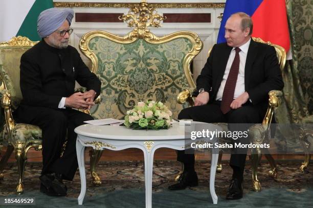 Russian President Vladimir Putin talks to Indian Prime Minister Manmohan Singh during their bilateral meeting in the Kremlin on October 21, 2013 in...