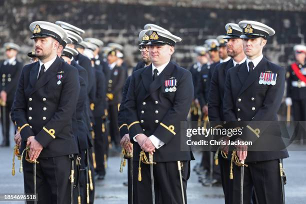 Royal Navy Cadets who have just undergone 29 weeks of intensive training stand to attention during a visit to The Lord High Admiral's Divisions at...