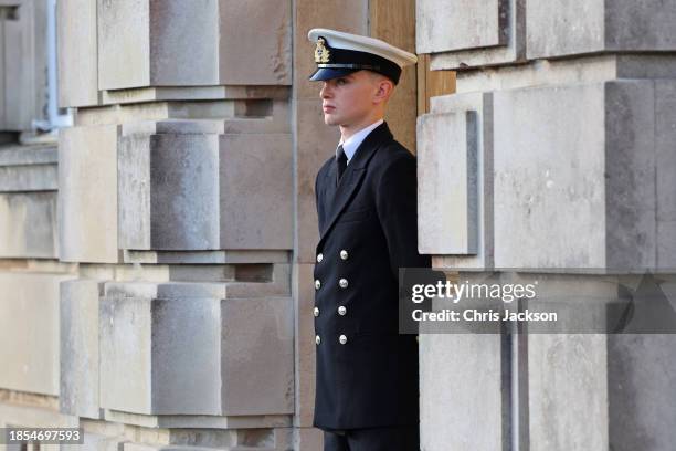General view of a Royal Navy Cadet who has just undergone 29 weeks of intensive training standing to attention during a visit to The Lord High...