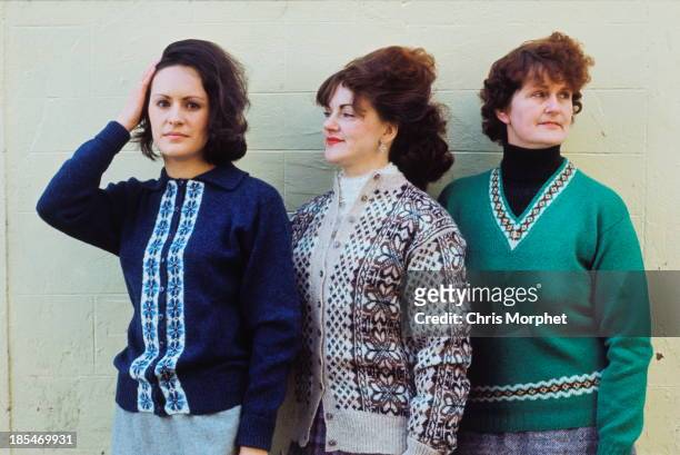 1st JUNE: Three women pose wearing Fair Isle sweaters in Lerwick, Shetland Islands in June 1970.