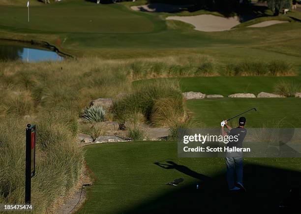 Webb Simpson watches his tee shot on the 17th hole during the final round of the Shriners Hospitals for Children Open at TPC Summerlin on October 20,...