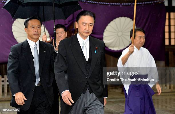 Chairman of the National Public Safety Commission and state minister in charge of Abduction Issues Keiji Furuya is seen visiting Yasukuni Shrine on...