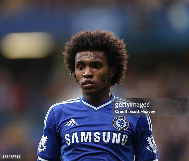 Willian of Chelsea in action during the Barclays Premier League match between Chelsea and Cardiff City at Stamford Bridge on October 19, 2013 in...