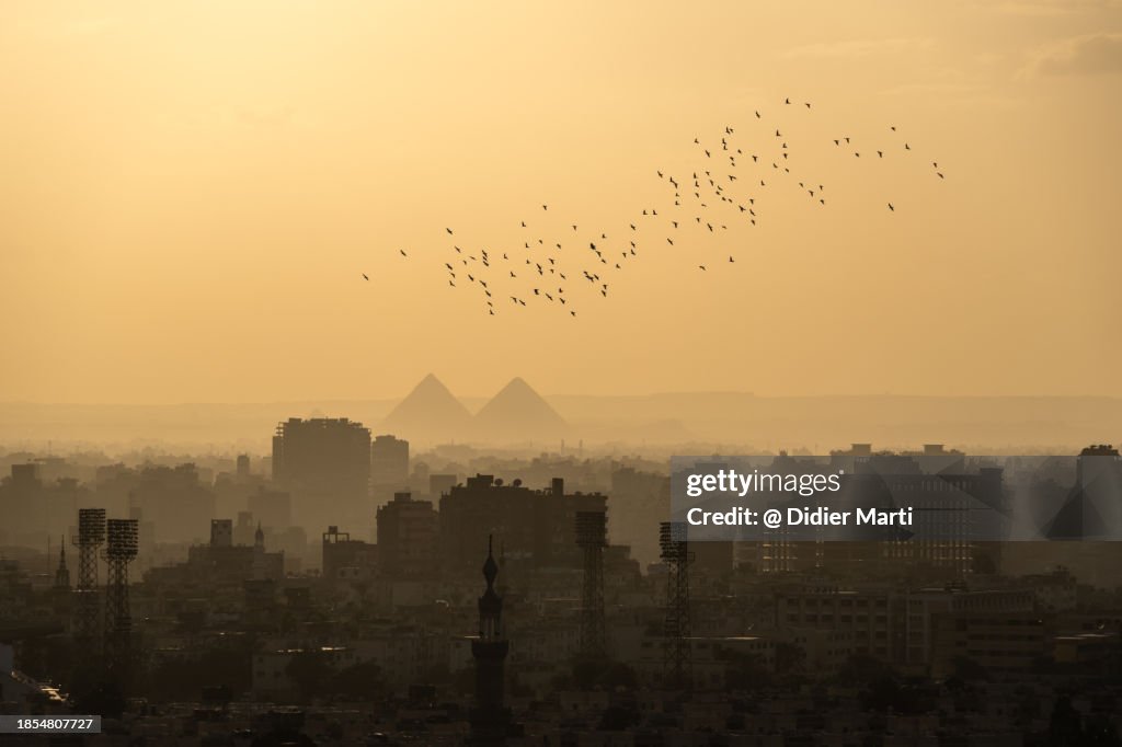 Sunset over Cairo and the Pyramids of Giza