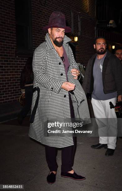 Jason Momoa leaves 'The Late Show With Stephen Colbert' at the Ed Sullivan Theater on December 13, 2023 in New York City.