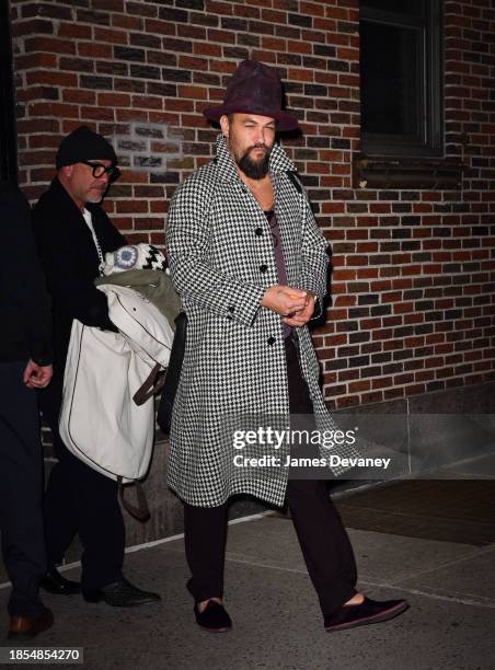 Jason Momoa leaves 'The Late Show With Stephen Colbert' at the Ed Sullivan Theater on December 13, 2023 in New York City.