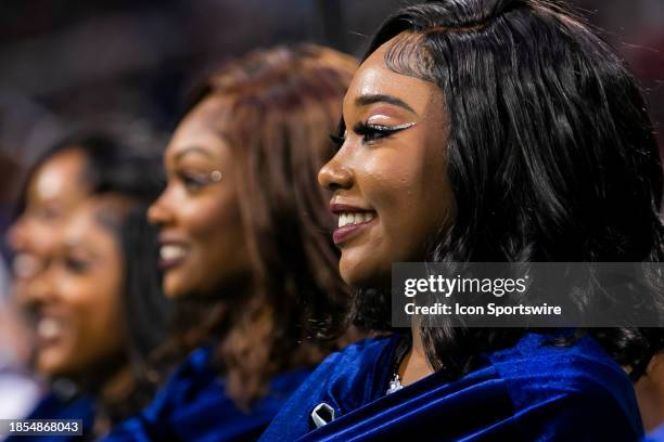 Members of the Ooh La La dance team of the Howard Marching Band await their time on the field during the Cricket Celebration Bowl Game between the...
