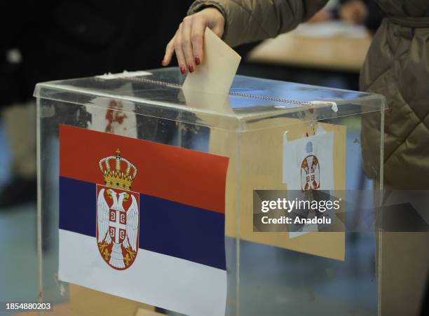 Citizens arrive at election centers to cast their ballots during local and general elections in Belgrade, Serbia on December 17, 2023. Serbians are...