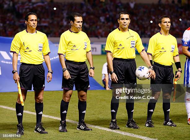 Assistant referee Marcos Quintero Huitron, reserve assistant referee Paul Enrique Delgadillo Haro, Referee Marco Antonio Rodriguez Moreno, and...