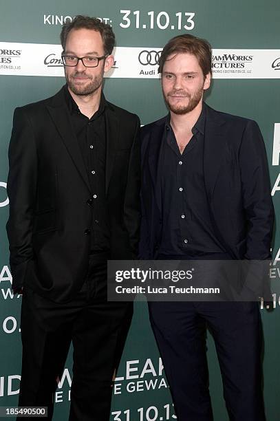 Daniel Domscheit-Berg and Daniel Bruehl attend the 'Inside Wikileaks' Germany Premiere at Kulturbrauerei on October 21, 2013 in Berlin, Germany.