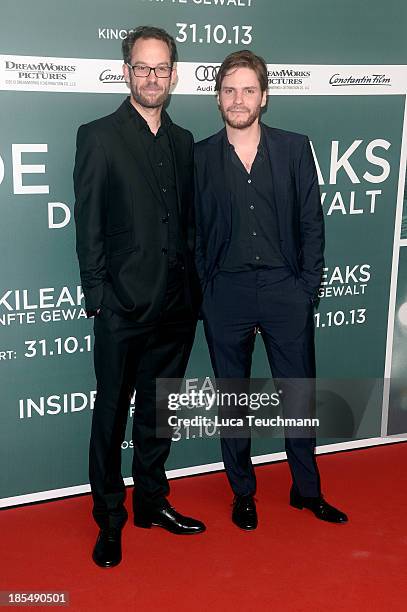 Daniel Domscheit-Berg and Daniel Bruehl attend the 'Inside Wikileaks' Germany Premiere at Kulturbrauerei on October 21, 2013 in Berlin, Germany.