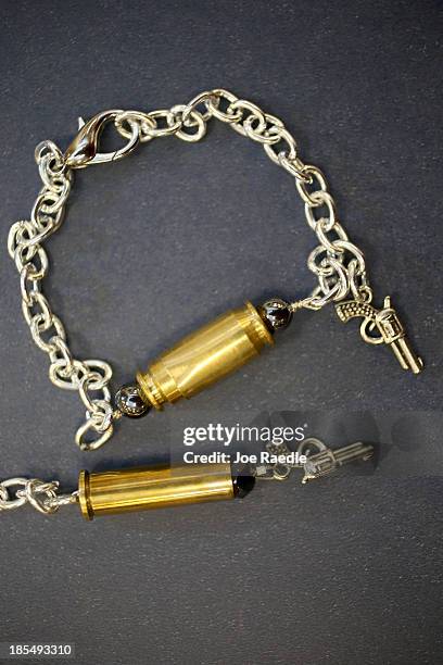 Some of the bracelets, earrings and necklaces are seen that Susan Kushlin's company, Gun Girls, Inc., created for women that enjoy guns on October...