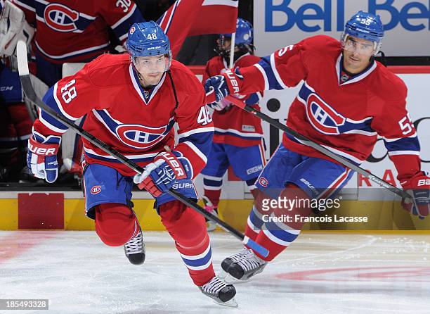 Daniel Briere and Francis Bouillon of the Montreal Canadiens skate during the NHL game against the Columbus Blue Jackets on October 17, 2013 at the...