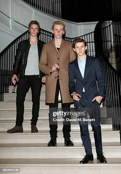 Sam Keeley, Edward Ashley and Breakthrough Brit Tom Holland attend the BAFTA 'Breakthrough Brits' event at Burberry 121 Regent Street, London on...