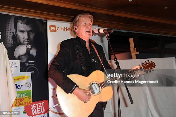 Singer Johnny Logan performs during the presentation of Manfred Baumann New Calendar 2014 at the King's Hotel Center on October 21, 2013 in Munich,...