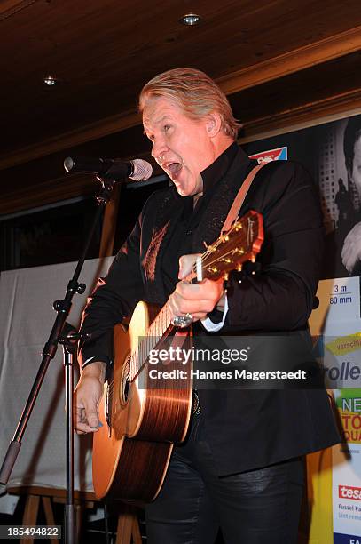 Singer Johnny Logan performs during the presentation of Manfred Baumann New Calendar 2014 at the King's Hotel Center on October 21, 2013 in Munich,...