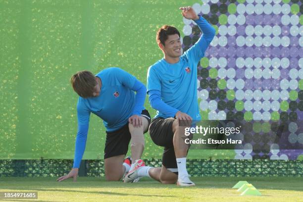 Hiroki Sakai of Urawa Red Diamonds warms up during the training session of Urawa Red Diamond at the training site of King Abdullah Sports City on...