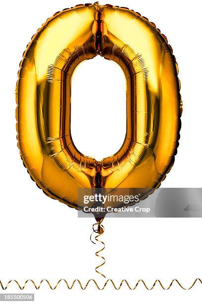 gold balloon in the shape of a number zero - globo de helio fotografías e imágenes de stock