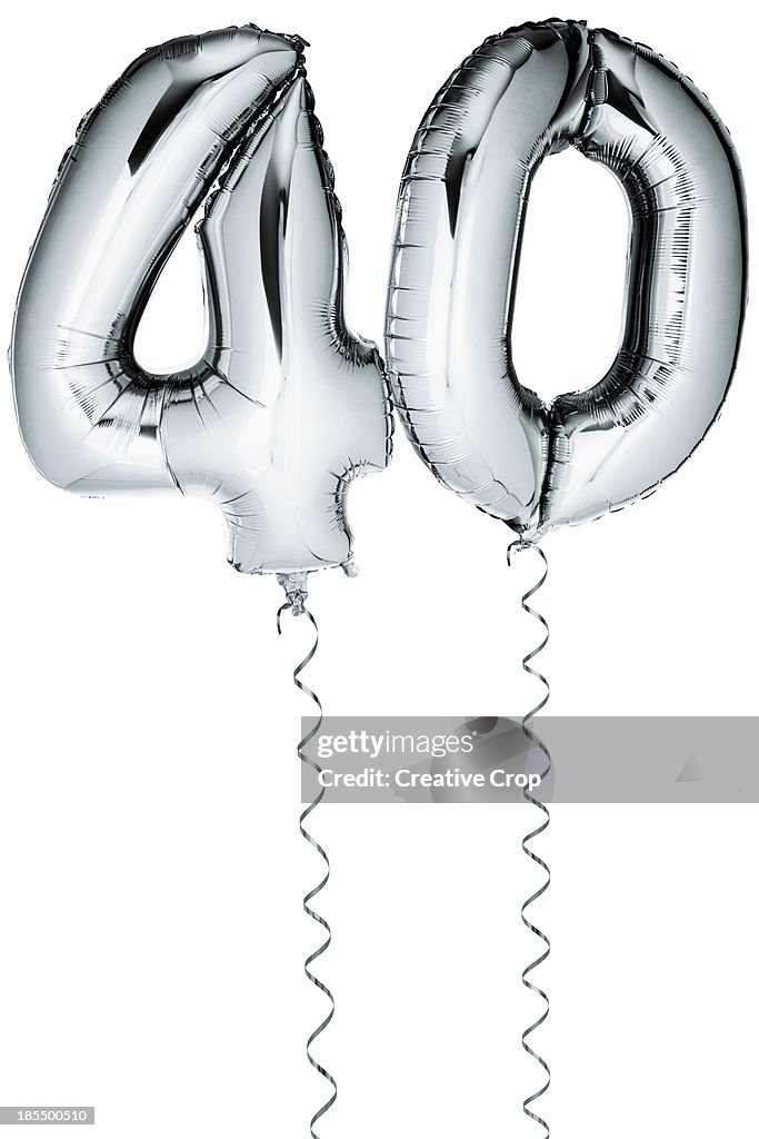 Silver balloons in the shape of a number 40