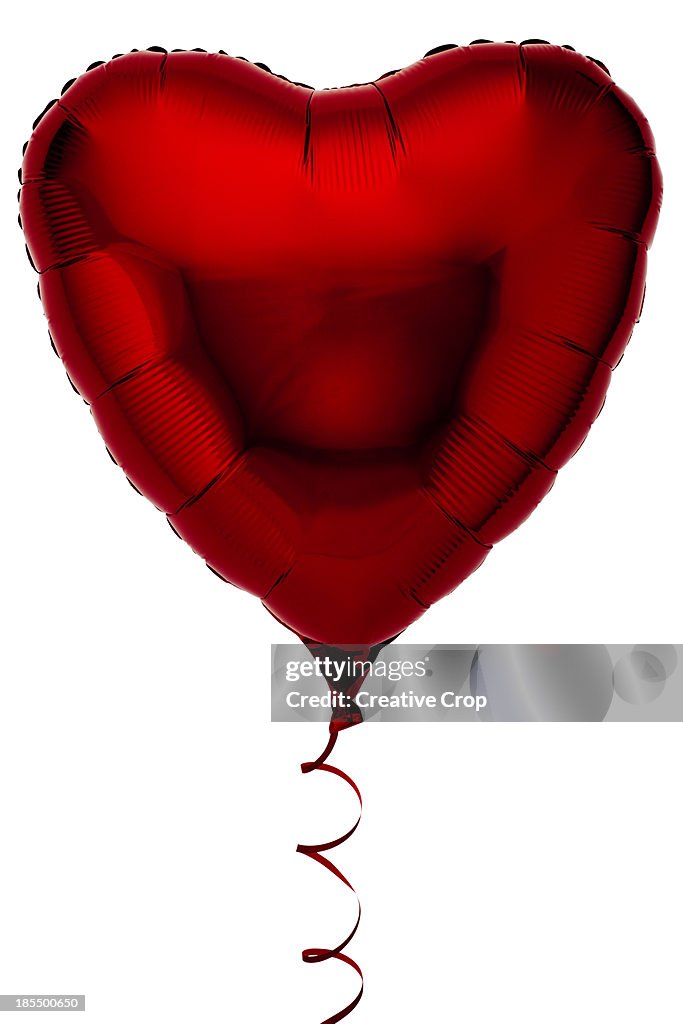 Red heart shaped foil party balloon