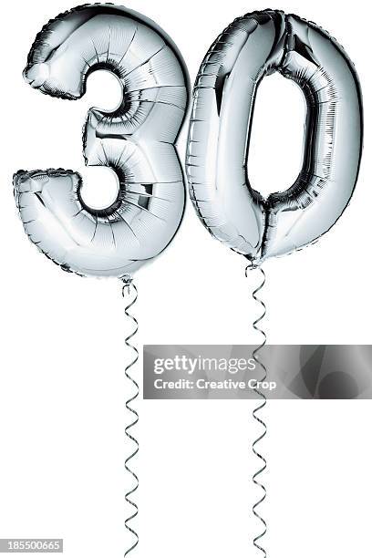 silver balloons in the shape of a number 30 - number 30 stock pictures, royalty-free photos & images