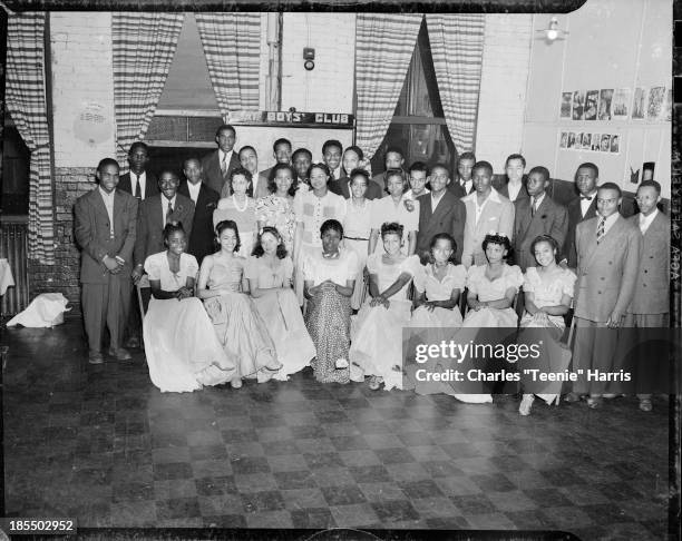 Group portrait gathered in Kay Boys Club, Pittsburgh, Pennsylvania, 1941. Including, seated from left: Marie Russell, Doris Corsey, Helen Davis,...