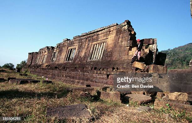 The ancient ruins of the Hindu Khmer temple of Wat Phu in Champassak Province, Laos. Historians claim that this temple was built as early as the 6th...