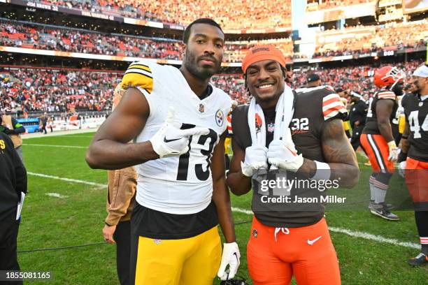 Wide receiver Miles Boykin of the Pittsburgh Steelers poses for a photo with wide receiver James Proche II of the Cleveland Browns after the game at...