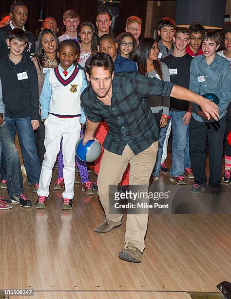 Paul Rudd Bowls with kids at the Paul Rudd 2nd Annual All-Star Bowling Benefit at Lucky Strike on October 21, 2013 in New York City.