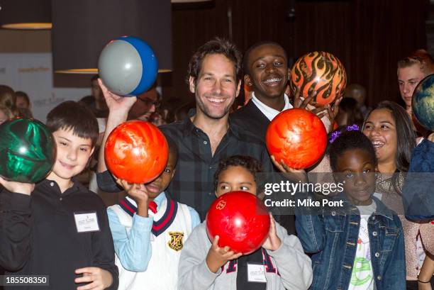 Paul Rudd Bowls with kids at the Paul Rudd 2nd Annual All-Star Bowling Benefit at Lucky Strike on October 21, 2013 in New York City.