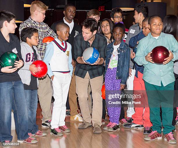 Paul Rudd Bowls with kids at the Paul Rudd 2nd Annual All-Star Bowling Benefit at Lucky Strike on October 21, 2013 in New York City.