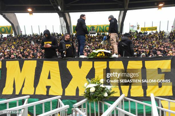 Nantes' supporters pay tribute to fellow supporter "Maxime", who died during clashes between Nantes and Nice fans, during the French L1 football...