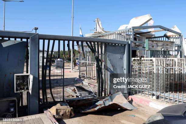 This picture taken during a media tour organised by the Israeli military on December 15 shows the damage to the Erez border crossing between southern...