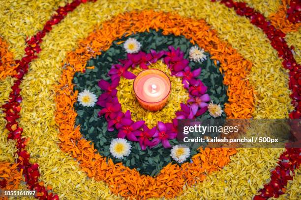 a thai buddhist offering,bengaluru,karnataka,india - rangoli stock-fotos und bilder
