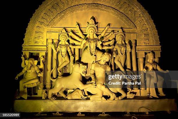 durga idol in unfinished condition - idols foto e immagini stock