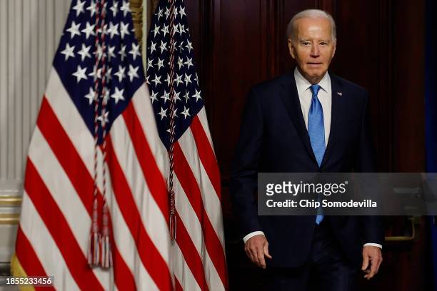 President Joe Biden arrives for a meeting of his National Infrastructure Advisory Council in the Indian Treaty Room of the Eisenhower Executive...