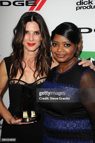 Honoree Sandra Bullock poses in the press room with actress Octavia Spencer during the 17th Annual Hollywood Film Awards at The Beverly Hilton Hotel...