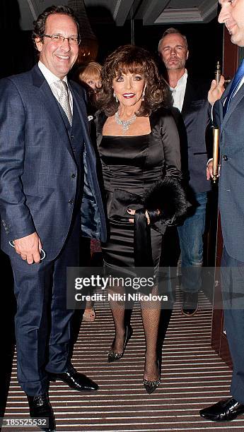 Joan Collins is sighted leaving the Westbury Hotel, Mayfair on October 21, 2013 in London, England.