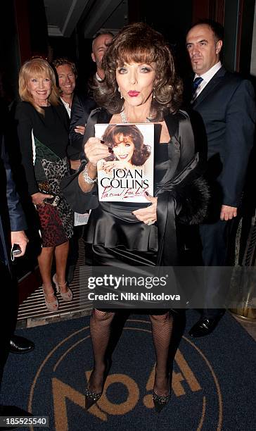 Joan Collins is sighted leaving the Westbury Hotel, Mayfair on October 21, 2013 in London, England.