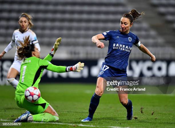Gaetane Thiney of Paris FC scores their team's second goal past Misa Rodriguez of Real Madrid during the UEFA Women's Champions League group stage...