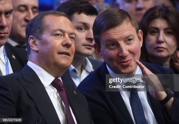 Russian State Council's Deputy Chairman Dmitry Medvedev listens to Council of the Federation's Senator Andrei Turchak during the 21th Congress of the...