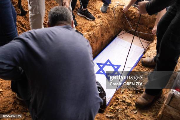 The body of Alon Shamriz, mistakenly killed by Israeli forces in Gaza earlier in the week after being held by Hamas since the October 7 attack, is...